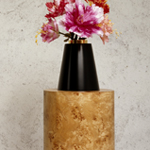 <p><strong><a href=ettore-sottsass.html class=link-lightbox>Ettore Sottsass</a></strong><br />Twenty-seven Woods for a Chinese Artificial Flower</p><p><strong>“ I “</strong><br />Flower vase in poplar briar, lacquered wood and  gold-plated brass.<br />d. 47 x h. 74 cm.</p><p>Limited edition of 12 signed and numbered pieces.</p>
