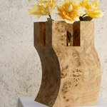 <p><strong><a href=ettore-sottsass.html class=link-lightbox>Ettore Sottsass</a></strong><br />Twenty-seven Woods for a Chinese Artificial Flower</p><p><strong>“ R “</strong><br />Flower vase in poplar briar and gold-plated brass.<br />33x 33 h. 60 cm.</p><p>Limited edition of 12 signed and numbered pieces.</p>